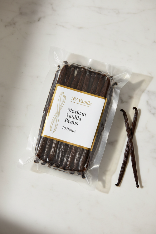 Packaged Mexican vanilla beans with a label on a marble surface